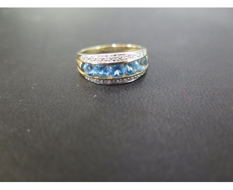 A 9ct gold topaz and diamond three-row dress ring - Hallmarked Birmingham - Ring size Q 1/2 - Weight approx 4.1gms
Condition 