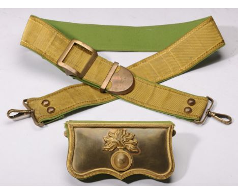 The cartridge box made in brass gilt and light green cloth-wool, sizes 16x9 cm, with grenade, beltâ€™s front displays in gold