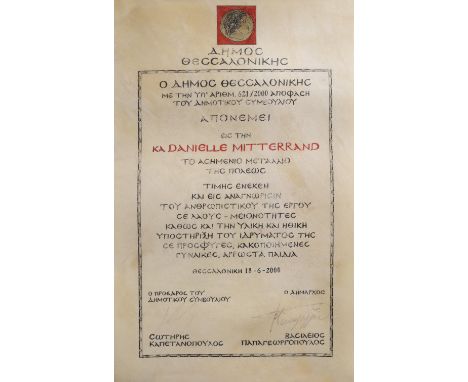 Awarding Document, 317x495 mm, dated 18.6.2000 to Danielle Mitterrand, wife of the French President Fancois Mitterrand, signe