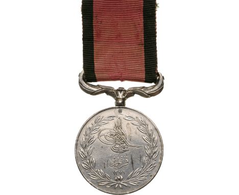 Breast Badge, 37 mm, named to "1816 James Alcorn. 79th Cameron. Highlanders." original suspension device and ribbon. Rare and