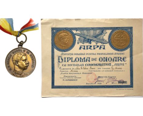 Breast Badge, 35 mm, Bronze, original suspension ring and tricolor ribbon, together with awarding document, dated 1933. Scarc