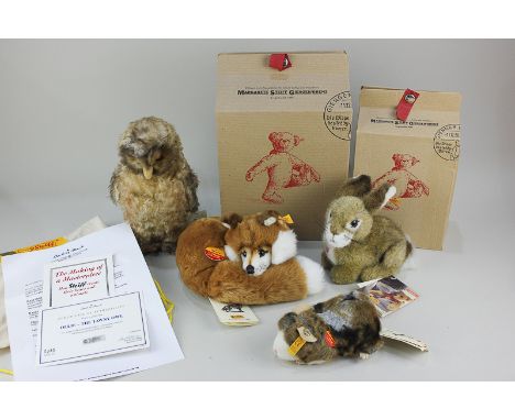 A Steiff tawny owl 'Ollie', with bag and certificate, a fox 'Xorry' with box, a rabbit with box and a guinea pig