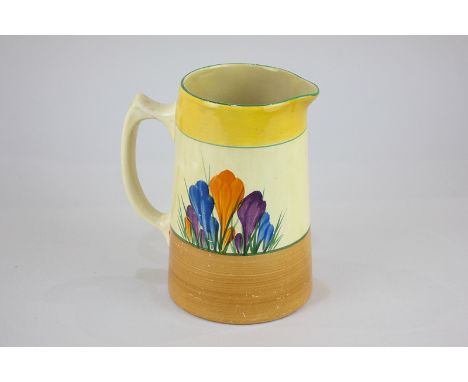 A Clarice Cliff Crocus pattern pottery jug, in the Bizarre range for Newport Pottery, 13cm high