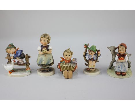 Five Goebels Hummel West German porcelain figures of children including Barnyard Hero, For Mother, Apple Tree Boy, and Good F