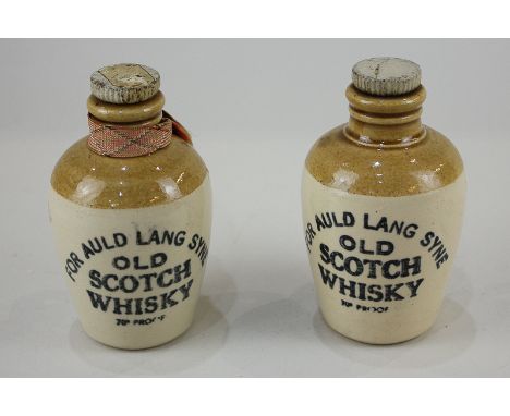 Two 'For Auld Lang Syne Old Scotch Whisky' miniature pottery flagons by Russell's Edinburgh, 10.5cm high, (empty)