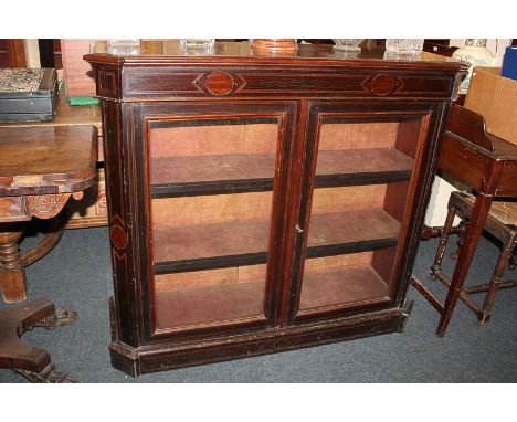 A Victorian inlaid mahogany break-front display cabinet, velvet lined interior with two shelves enclosed by two glazed panel 