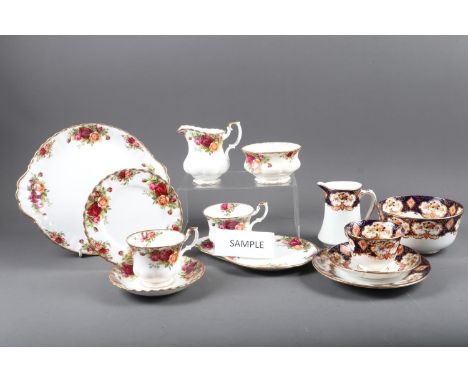 A Royal Albert "Old Country Roses" pattern part teaset, and a Royal Albert "Heirloom" pattern part teaset