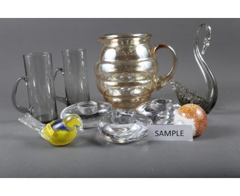 A set of twelve 1960s smoked glass mugs, three Orrefors pebble candle holders and other smoked glass etc