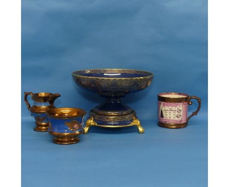 A Carltonware Chinoiserie pattern Bowl on Stand, the blue ground decorated heaving with figures, pagodas, etc, with heavy gil