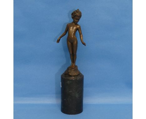 A French Art Deco patinated bronze of a Nude, impressed signature "Melo", on black marbled column base, overall 32cm high. 