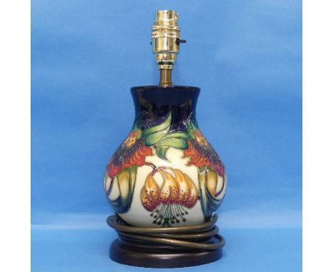 A Moorcroft pottery 'Anna Lilly' pattern Lamp and Shade, on fitted wooden plinth, with mark to base, H 26cm (without shade) 