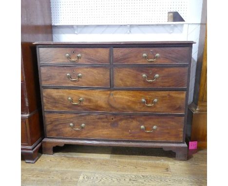 A 19thC flame mahogany Chest of Drawers, four short drawers over two long drawers, raised on bracket feet, one back foot deta