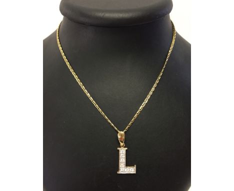 A 9ct gold initial L pendant set with crystals, on a fancy link 9ct gold chain.  Pendant weight approx 2.2g, chain weight app