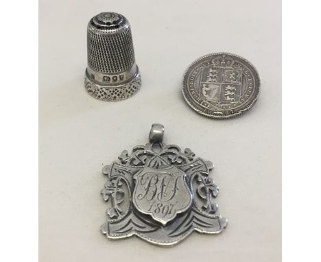 3 antique silver items comprising thimble hallmarked London 1894, a brooch made from an 1887 silver shilling and watch chain 