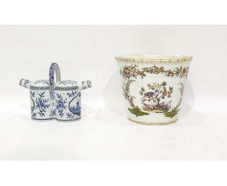 Late 19th/early 20th century continental porcelain jardiniere, bucket-shaped and painted with exotic birds on branches within