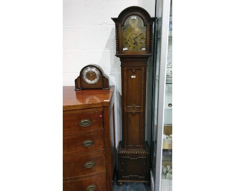 20th century oak cased longcase clock of small proportions, brass dial with Roman numerals, arch marked 'Westminster Whitting