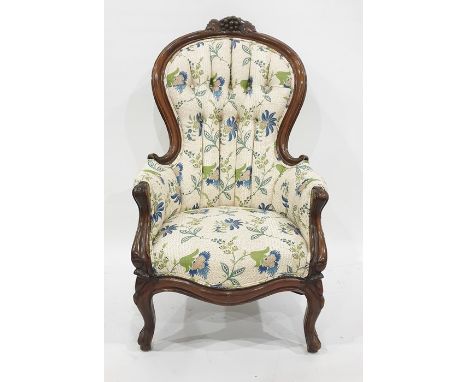 Victorian mahogany scoop back armchair, the cresting with fruiting vine, button upholstered and having serpentine-fronted sea