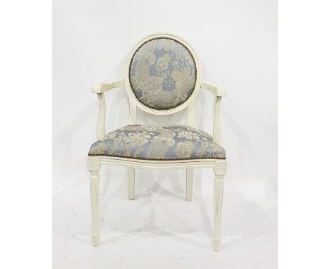 Victorian armchair with button-back foliate upholstery, serpentine fronted seat, cabriole supports and a cream painted bedroo