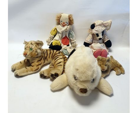 Steiff tiger, a Merrythought seal pyjama case, a Wendy Boston clown, a badger, a small tiger&nbsp;and a Chad Valley rocking h