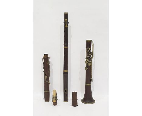 Stained wood flute and a clarinet 