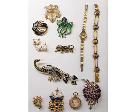 Two cases of assorted costume jewellery to include brooch in the form of an octopus, another as a tiger, lady's yellow metal 