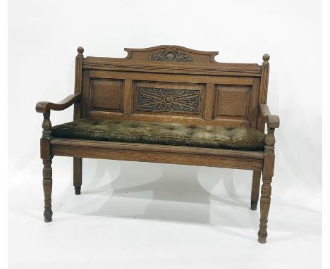 Oak bench with carved panel back, open arms, ring turned front legsCondition Reportimage as requested