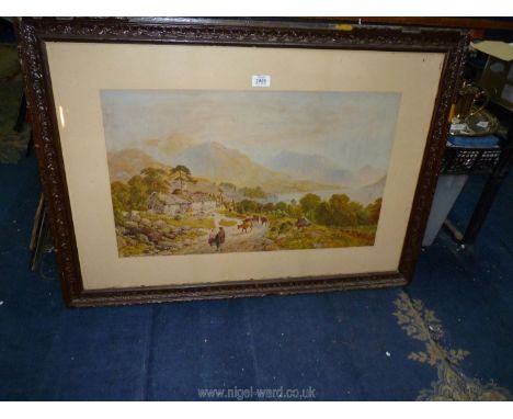 A carved wooden framed Lithograph depicting a highland scene with figures in conversation, and cattle walking the tracks, and