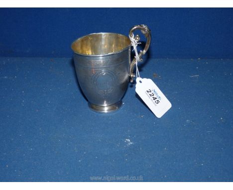 A Silver Christening Cup with initials W.W.J to the front with engine turned detail of dots and lines all over and with ornat