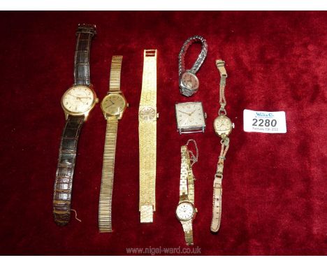 Several vintage wristwatches including; a gents Ingersoll with leather alligator Omega strap.