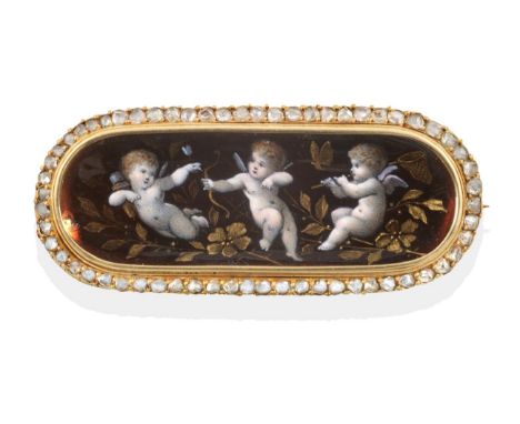 A French Enamel and Diamond Brooch, an oval plaque enamelled depicting three putto amongst flowers, on a burgundy ground, wit