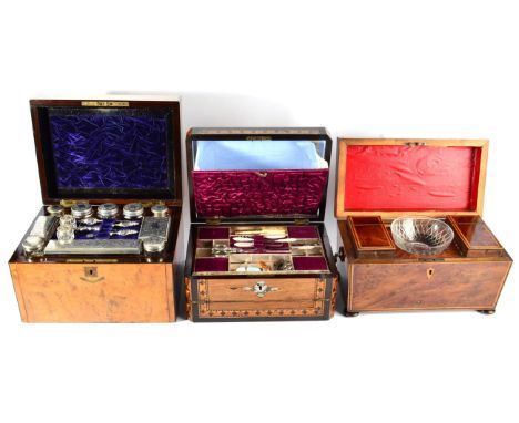 A Victorian Walnut and Burr Walnut Vanity Case, containing silver plate topped glass bottles and other accoutrements, the hin