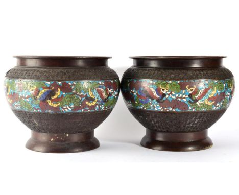 A Pair of Chinese Cloisonné Enamel Jardinières, late 19th century, of ovoid form, decorated with a band of birds amongst foli