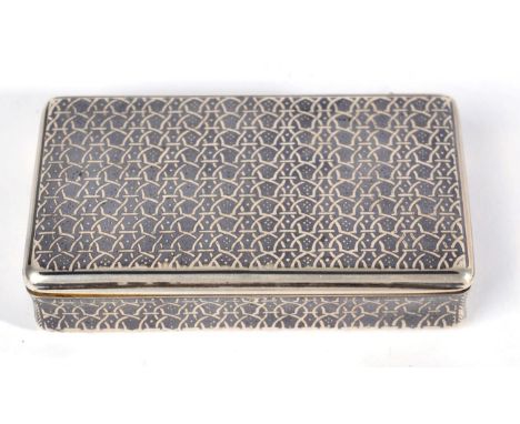 A French SiIver and Niello Snuff Box, maker's mark L?, 19th century, rectangular with hinged cover and all over geometric dec