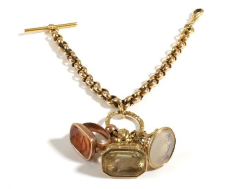 A Thick Curb Link Albert, with T-bar and Clip, Suspending Three Large Intaglio Fob Seals, length 23cm .  The chain and seals 