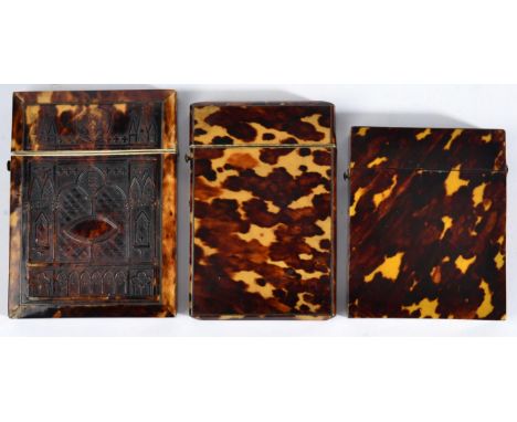 A Pressed Tortoiseshell Card Case, 19th century, with Gothic architectural decoration; and Two Blonde Tortoiseshell Card Case