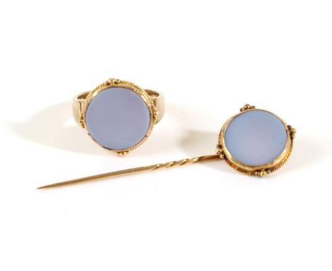 A 9 Carat Gold Sardonyx Signet Ring, a round sardonyx plaque in a rubbed over setting within a beaded border, to a tapering s