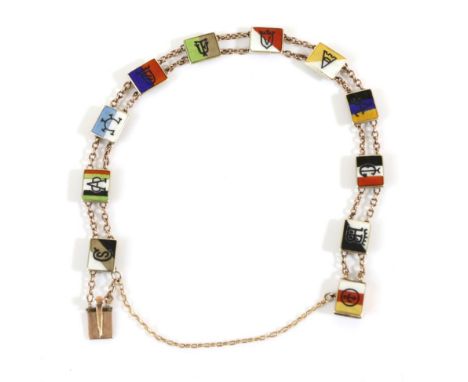 A Circa 1920s Enamel Flag Bracelet, of eleven various enamelled links, connected by trace chains, length 19cm.  The bracelet 