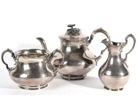 A Victorian Silver Three Piece Tea Service, Messrs Barnard, London 1846, plain baluster form, the handles and spout with foli