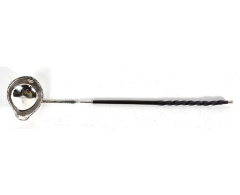 A George III Silver Toddy Ladle, maker's mark W.W, circa 1800, with baleen handle, 36cm long 