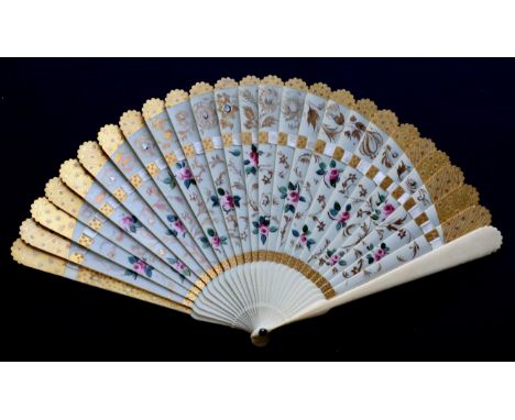 An Early 19th Century Ivory Brisé Fan, with shaped tips to the two guards and 26 inner sticks, with a blue glass stone to the