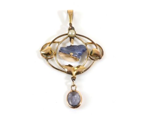 An Art Nouveau Sapphire and Pearl Pendant, a carved sapphire bird suspended within a pearl set frame, with a carved intaglio 