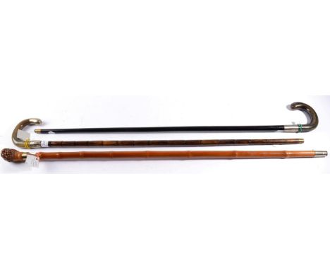 A Silver and Horn Mounted Ebonised Walking Stick, London 1919, the ferrule engraved with initials on an engine turned ground,