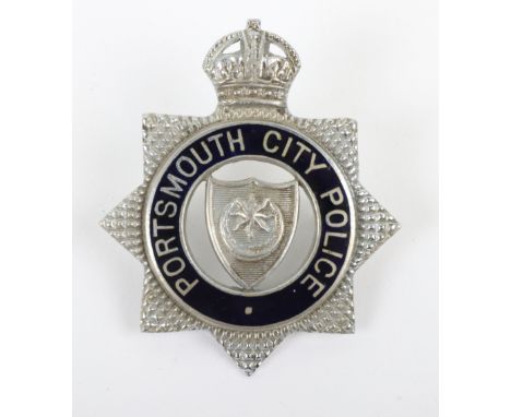 Portsmouth City Police Senior Officers Cap Badge pre 1952,Kings crown, blue enamel, chrome star, with two rear fixing lugs.