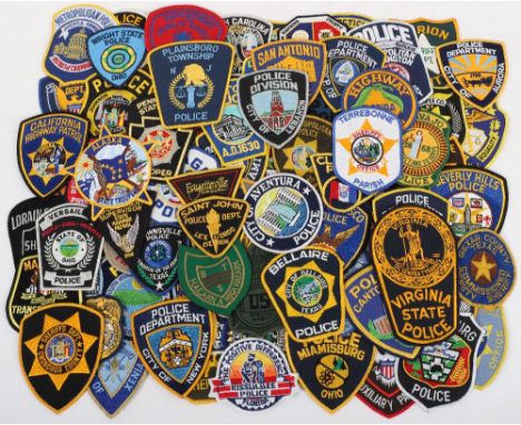 Collection of One Hundred Obsolete USA Police Cloth Patch Badges, including:Iowa State police, South Dakota highway patrol, C