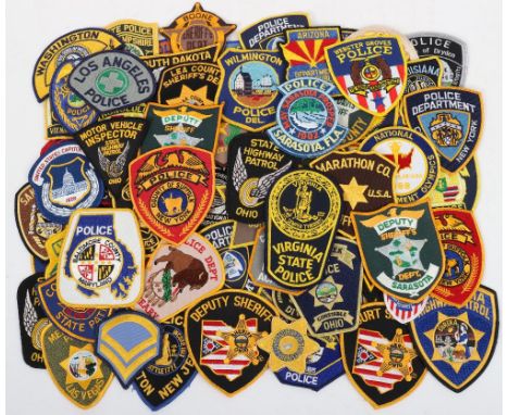 Collection of One Hundred Obsolete USA Police Cloth Patch Badges, including: Missouri State Highway patrol, State of Kansas H