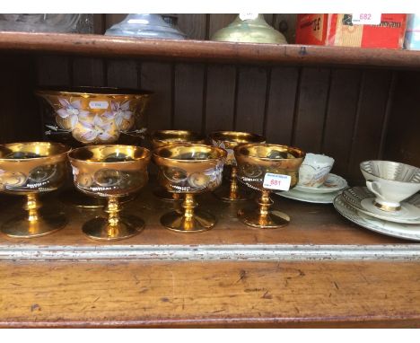 GILT GLASS SET AND SOME CHINA CUPS AND SAUCERS