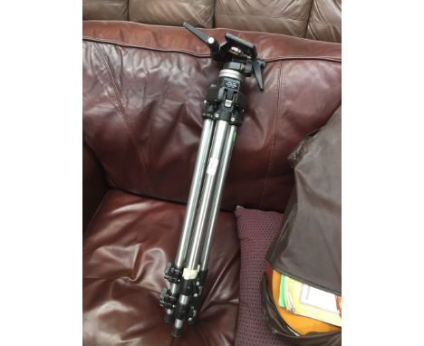 A MANFROTTO MODEL 55 CAMERA TRIPOD