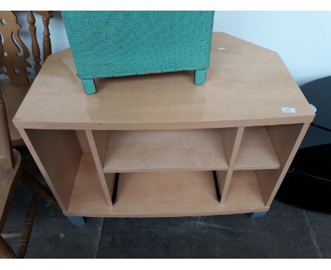 A LIGHT WOOD VENEERED TV STAND