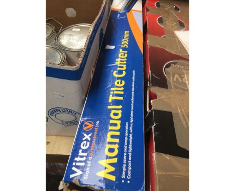 A MANUAL TILE CUTTER