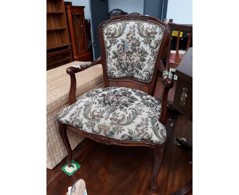 A TAPESTRY UPHOLSTERED ARMCHAIR
